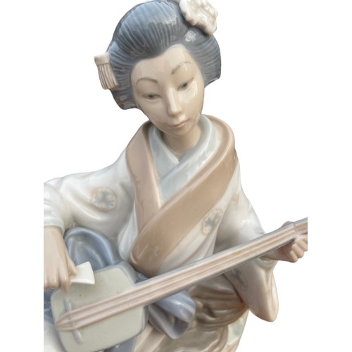 27 - NAO CHIESA GIRL PLAYING THE FLUTE 11x10