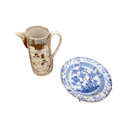 129 - AN ORIENTAL BLUE AND WHITE BOWL AND JAPANESE JUG