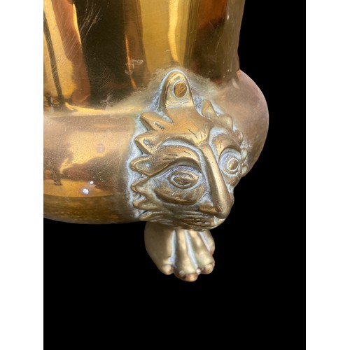 130 - HEAVY BRASS JARDINAIRE ON PAW FOOT WITH FACES ABOVE