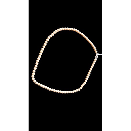 148 - BIEGE PEARL NECKLACE WITH 9ct GOLD CLASP