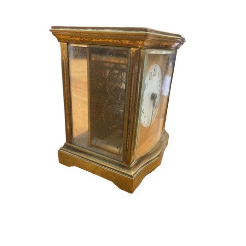 151 - A FRENCH BRASS CLOCK WITH BEVELLED GLASS APPROX 3.5