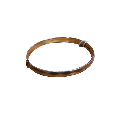 152 - 1/5 9ct ROLLED GOLD BANGLE