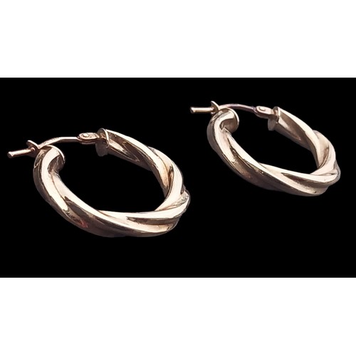 186 - A PAIR OF 9 ct GOLD TWIST HOOP EARRINGS