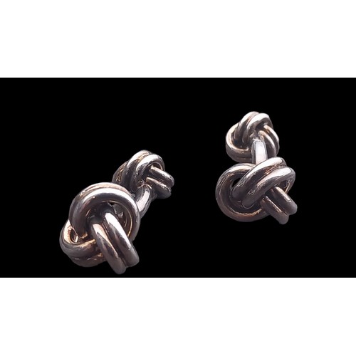 189 - A PAIR OF SILVER KNOT PATTERN CUFFLINKS