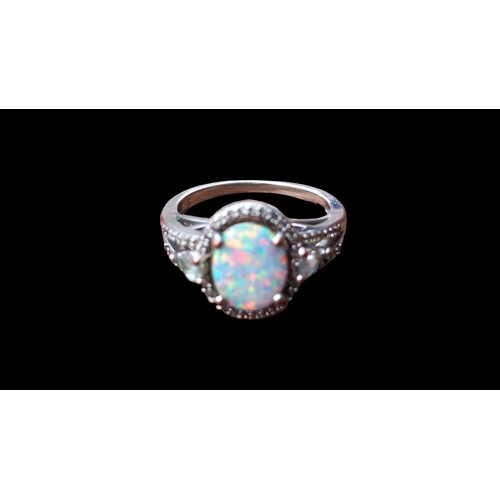 202 - A QUALITY SILVER RING SET WITH AN OPAL STYLE RING