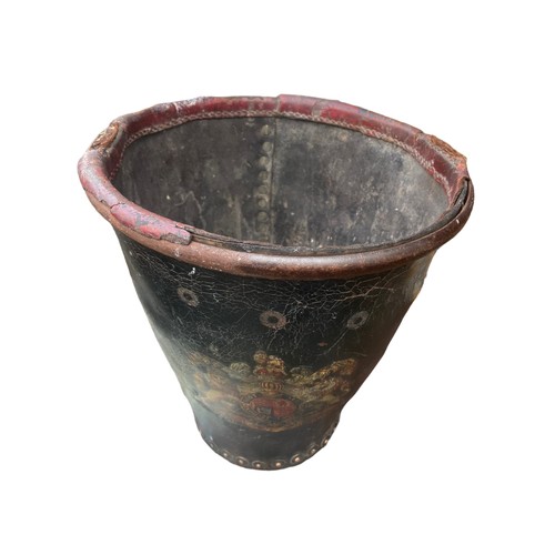 217 - A CRESTED ANTIQUE LEATHER BUCKET 11.5