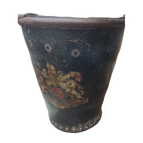 217 - A CRESTED ANTIQUE LEATHER BUCKET 11.5