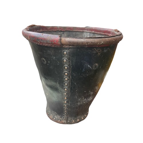 217 - A CRESTED ANTIQUE LEATHER BUCKET 11.5