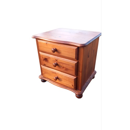 304 - A PINE 3 DRAWERED BEDSIDE