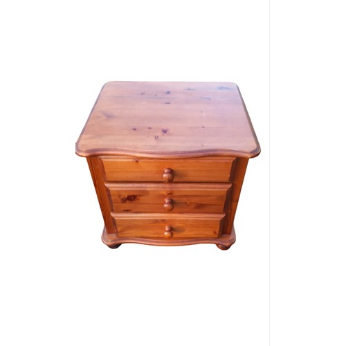 304 - A PINE 3 DRAWERED BEDSIDE