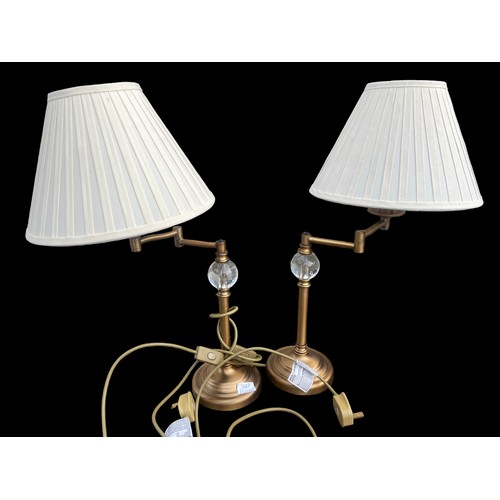 222 - PAIR OF ORNATE BRASS SWIVEL TABLE LAMPS