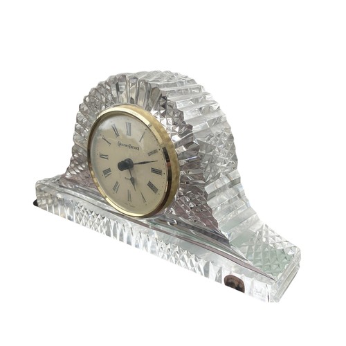 257 - A LARGE TYRONE CRYSTAL CLOCK ON STAND