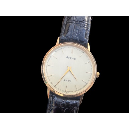 409 - A BEAUTIUFL 9CT QUARTZ MOVEMENT ACCURIST WATCH IN ITS ORIGINAL BOX & STRAP