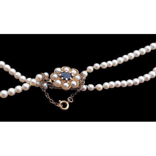 421 - A DOUBLE ROW GRADUATED PEARL NECKLACE 18