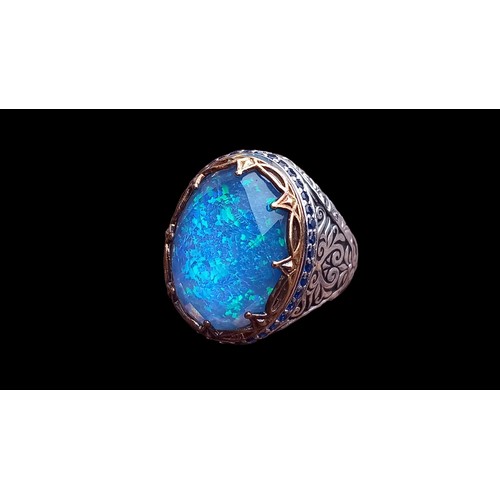 430 - EXTREMLY ORNATE SILVER RING SET WITH BLUE OPAL STYLE STONE