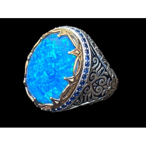 430 - EXTREMLY ORNATE SILVER RING SET WITH BLUE OPAL STYLE STONE