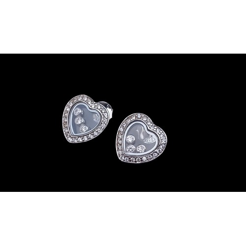 446 - A DESIGNER STYLE 9ct WHITE GOLD DIAMOND HEART EARRINGS WITH 3 FLOATING DIAMONDS TO CENTRE