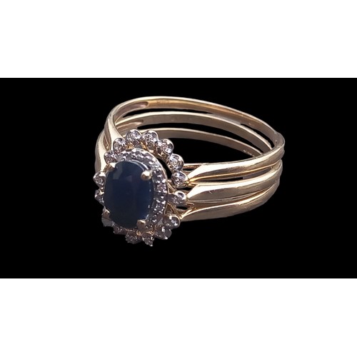 449 - 9ct GOLD SAPPHIRE AND DIAMOND RING WITH FITTINGS RINGS TO EACH SIDE 7 DIAMONDS TO EACH OVAL SETTING ... 