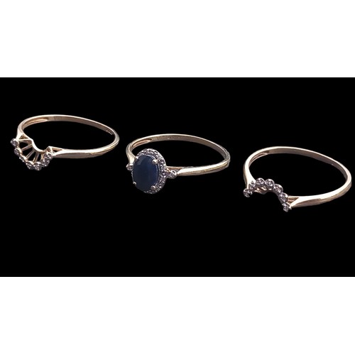 449 - 9ct GOLD SAPPHIRE AND DIAMOND RING WITH FITTINGS RINGS TO EACH SIDE 7 DIAMONDS TO EACH OVAL SETTING ... 