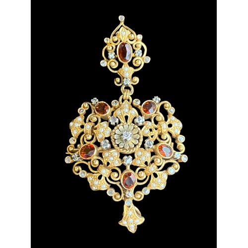 462 - A BROOCH/ PENDANT  ANTIQUE ,VERY DETAILED SET WITH DIAMONDS ,SEED PEARLS (2 MISSING) AND BROWN STONE... 