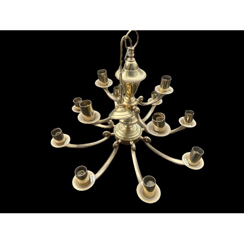 500 - AN ORNATE HEAVY BRASS 12 BRANCH CHANDILIER