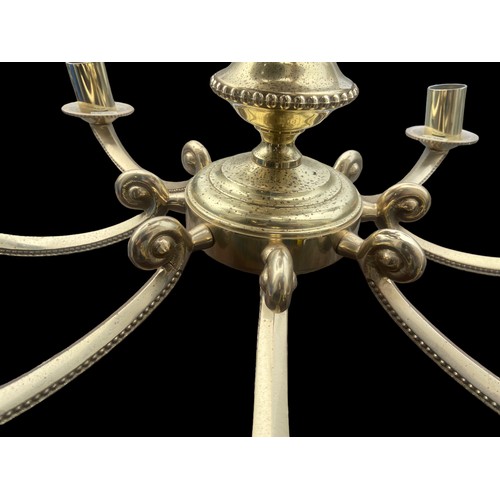 500 - AN ORNATE HEAVY BRASS 12 BRANCH CHANDILIER