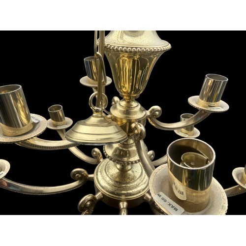 500 - AN ORNATE HEAVY BRASS 12 BRANCH CHANDILIER