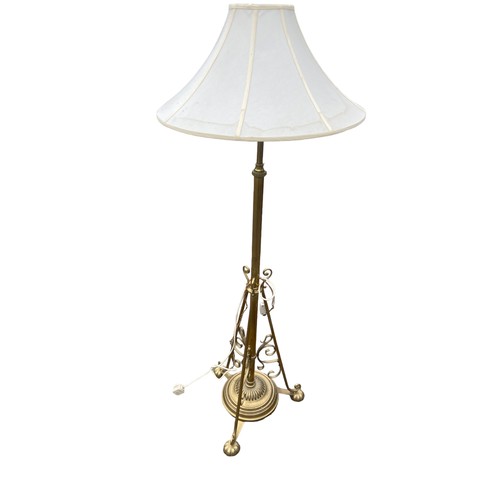 503 - AN ORANTE ANTIQUE BRASS RISEA NAD FALL STANDARD LAMP