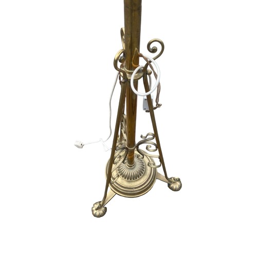 503 - AN ORANTE ANTIQUE BRASS RISEA NAD FALL STANDARD LAMP