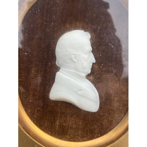 516 - A SIGNED WALNUT FRAMED BUST OF A GENT 11.5X10