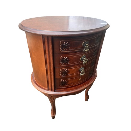 522 - A MULTI DRAWERED BARRELL CHEST