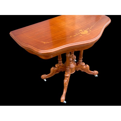 514 - A BEAUTIFUL MARQ TOPPED INLAID GAMES TABLE ON A QUAD BASE