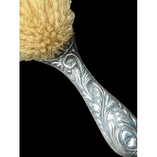 480 - A BEAUTIFULLY EMBOSSED SILVER BRUSH