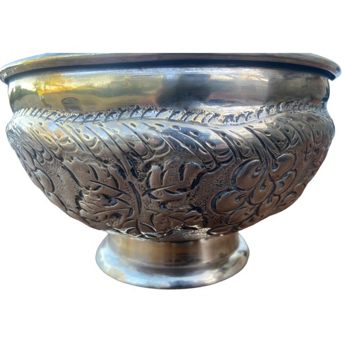 580 - A LARGE HEAVY EMBOSSED FRUIT BOWL