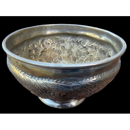 580 - A LARGE HEAVY EMBOSSED FRUIT BOWL