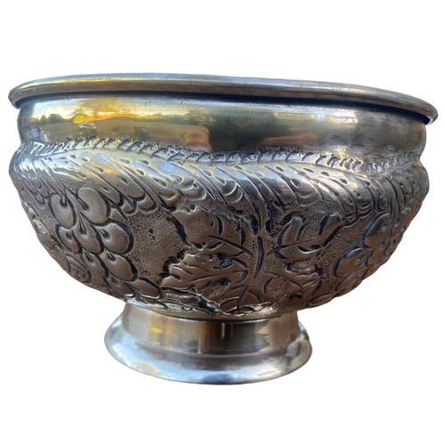 580 - A LARGE HEAVY EMBOSSED FRUIT BOWL