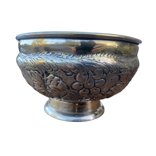 580 - A LARGE HEAVY EMBOSSED FRUIT BOWL