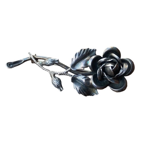 544 - A SILVER FLORAL BROOCH, SILVER AZTEC BROOCH & SILVER CORSS