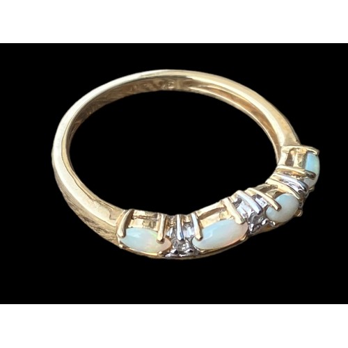 551 - A 9CT GOLD OPAL & DIAMOND RING