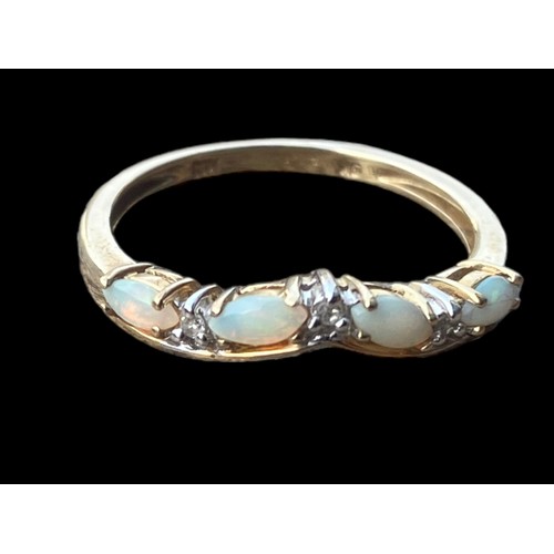 551 - A 9CT GOLD OPAL & DIAMOND RING