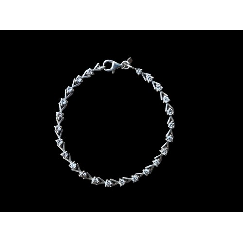 567 - A SILVER CRYSTAL SET BRACELET