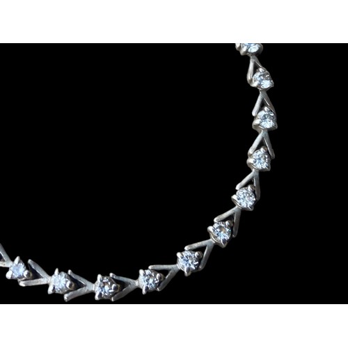 567 - A SILVER CRYSTAL SET BRACELET