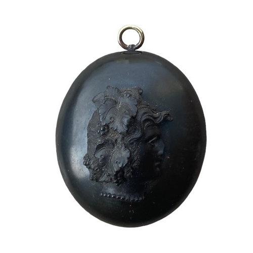 570 - A VICTORIAN BOG OAK CAMEO LOCKET