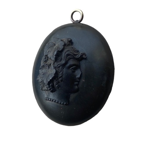 570 - A VICTORIAN BOG OAK CAMEO LOCKET