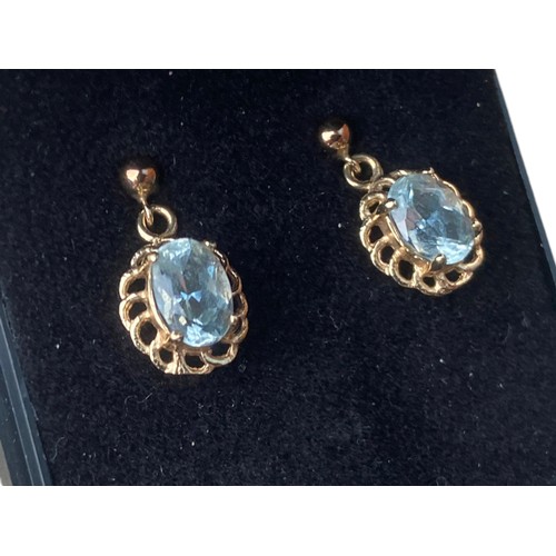 572 - A PAIR OF 9CT GOLD & BLUE TOPAZ DROP EARRINGS BOXED