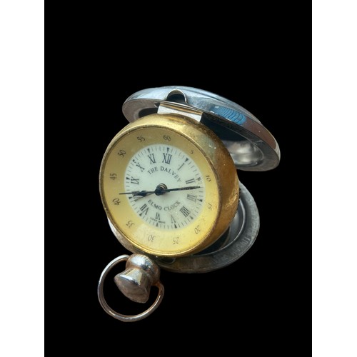 587 - A COLLECTABLE TRAVEL CLOCK IN PLATED CASE