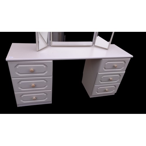 77 - A KNEEHOLE DRESSING CHEST WITH A GULLWING MIRROR AND MATCHING 3 DRAWERED CHEST