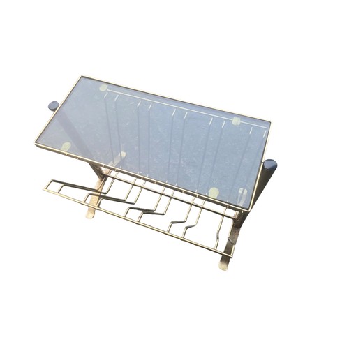 88 - A VINTAGE METAL MAZINE TABLE WITH GLASS TOP