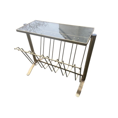 88 - A VINTAGE METAL MAZINE TABLE WITH GLASS TOP