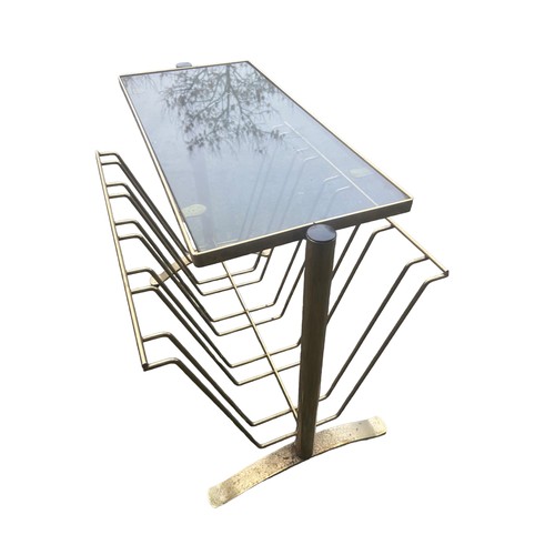 88 - A VINTAGE METAL MAZINE TABLE WITH GLASS TOP